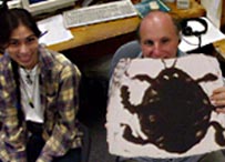 Animators Sheldon Cohen and Jo Meuris with image from The Metamorphosis of Mr. Samsa by Caroline Leaf, nfb1977